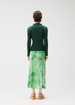 A model wears the PLEATS PLEASE ISSEY MIYAKE FOGGY FOREST skirt.