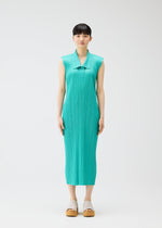 A model wears the PLEATS PLEASE ISSEY MIYAKE MONTHLY COLORS MAY dress.