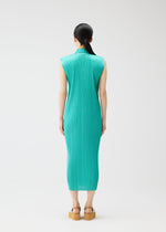 A model wears the PLEATS PLEASE ISSEY MIYAKE MONTHLY COLORS MAY dress.