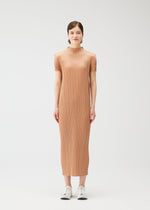 A model wears the PLEATS PLEASE ISSEY MIYAKE MONTHLY COLORS : JUNE monthly-colors-june-dress-charcoal.