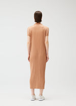 A model wears the PLEATS PLEASE ISSEY MIYAKE MONTHLY COLORS : JUNE monthly-colors-june-dress-charcoal.