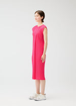 A model wears the PLEATS PLEASE ISSEY MIYAKE MONTHLY COLORS : JUNE monthly-colors-june-dress-yellow-green-1.
