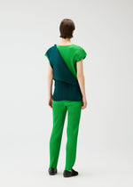 A model wears the PLEATS PLEASE ISSEY MIYAKE SWING dress.