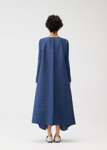 A model wears the PLEATS PLEASE ISSEY MIYAKE CITY FRAME dress.