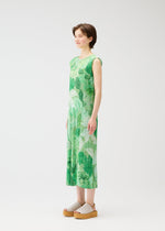 A model wears the PLEATS PLEASE ISSEY MIYAKE FOGGY FOREST dress.