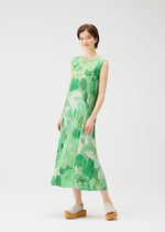 A model wears the PLEATS PLEASE ISSEY MIYAKE FOGGY FOREST dress.