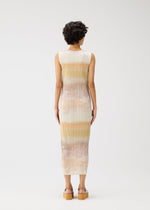 A model wears the PLEATS PLEASE ISSEY MIYAKE SEA BUBBLE dress.