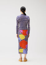 A model wears the PLEATS PLEASE ISSEY MIYAKE BASKET basket-shirt-green.