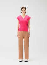 A model wears the PLEATS PLEASE ISSEY MIYAKE MONTHLY COLORS : JUNE monthly-colors-june-shirt-charcoal.