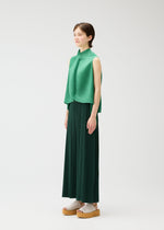 A model wears the PLEATS PLEASE ISSEY MIYAKE LEAF shirt.