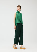A model wears the PLEATS PLEASE ISSEY MIYAKE LEAF shirt.