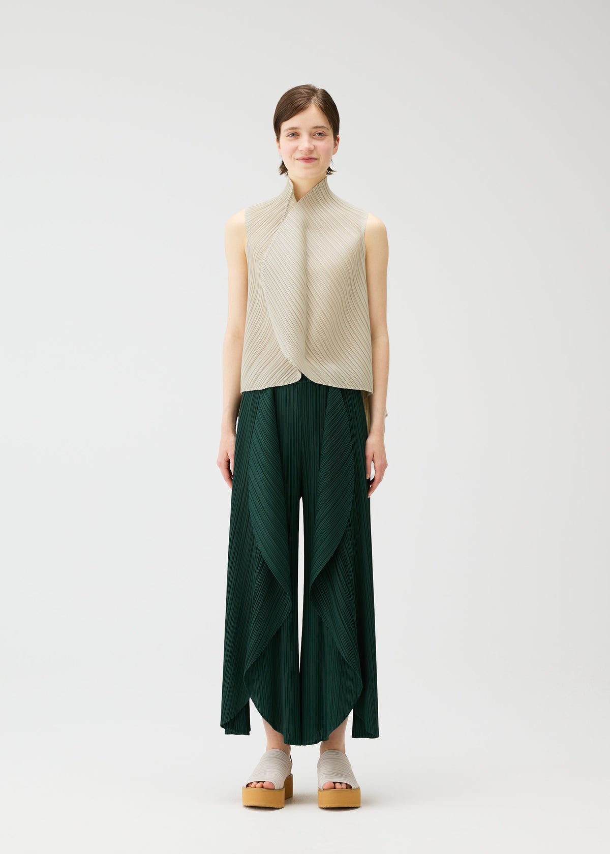 A model wears the PLEATS PLEASE ISSEY MIYAKE LEAF shirt.