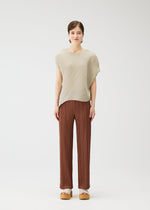 A model wears the PLEATS PLEASE ISSEY MIYAKE LEAF shirt.