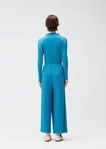 A model wears the PLEATS PLEASE ISSEY MIYAKE FACADE shirt.