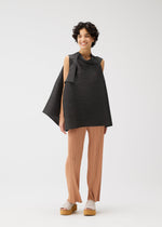 A model wears the PLEATS PLEASE ISSEY MIYAKE BOUNCY BASKET bouncy-basket-shirt-charcoal.