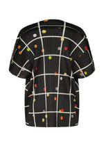 A detail shot of the PLEATS PLEASE ISSEY MIYAKE CROSSING DOTS shirt.