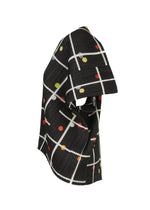 A detail shot of the PLEATS PLEASE ISSEY MIYAKE CROSSING DOTS shirt.
