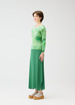 A model wears the PLEATS PLEASE ISSEY MIYAKE FOGGY FOREST shirt.