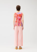 A model wears the PLEATS PLEASE ISSEY MIYAKE FOGGY FOREST shirt.