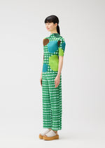 A model wears the PLEATS PLEASE ISSEY MIYAKE MARKET market-shirt-potato-1.