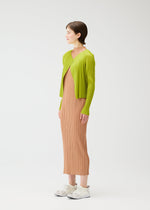 A model wears the PLEATS PLEASE ISSEY MIYAKE MONTHLY COLORS : JUNE monthly-colors-june-cardigan-blue-green.