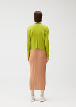 A model wears the PLEATS PLEASE ISSEY MIYAKE MONTHLY COLORS : JUNE monthly-colors-june-cardigan-blue-green.