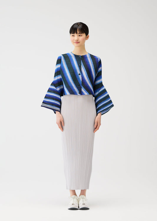 A model wears the PLEATS PLEASE ISSEY MIYAKE CITY COLLAGE clothing.