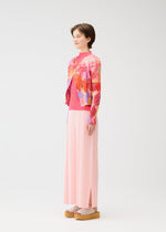 A model wears the PLEATS PLEASE ISSEY MIYAKE FOGGY FOREST cardigan.