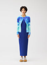 A model wears the PLEATS PLEASE ISSEY MIYAKE SEA BUBBLE cardigan.