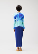 A model wears the PLEATS PLEASE ISSEY MIYAKE SEA BUBBLE cardigan.