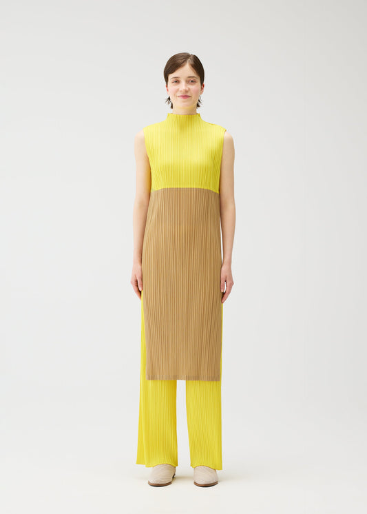 A model wears the PLEATS PLEASE ISSEY MIYAKE SWING dress.