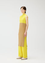 A model wears the PLEATS PLEASE ISSEY MIYAKE SWING dress.