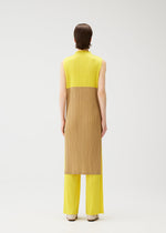 A model wears the PLEATS PLEASE ISSEY MIYAKE SWING dress.