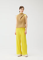 A model wears the PLEATS PLEASE ISSEY MIYAKE SWING dress.