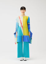 A model wears the PLEATS PLEASE ISSEY MIYAKE CITY COLLAGE clothing.