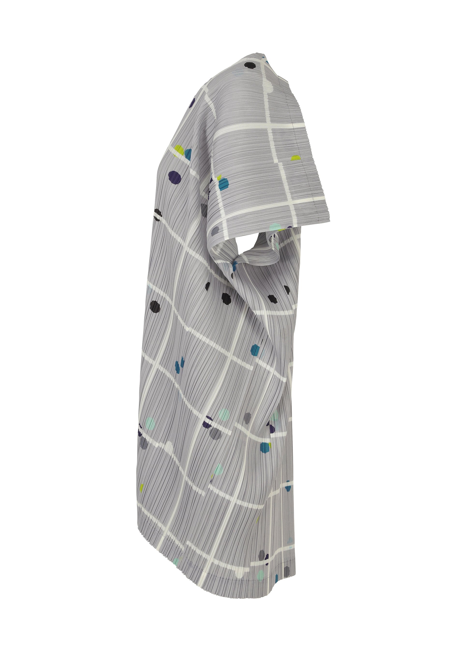 A detail shot of the PLEATS PLEASE ISSEY MIYAKE CROSSING DOTS dress.