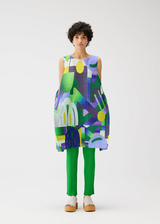 A model wears the PLEATS PLEASE ISSEY MIYAKE PLAYGROUND dress.