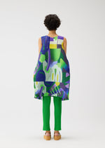 A model wears the PLEATS PLEASE ISSEY MIYAKE PLAYGROUND dress.