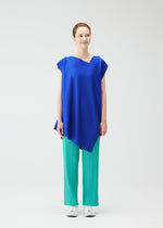 A model wears the PLEATS PLEASE ISSEY MIYAKE A POC SEA GLASS tunic.