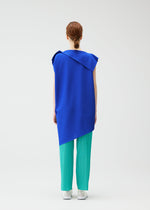 A model wears the PLEATS PLEASE ISSEY MIYAKE A POC SEA GLASS tunic.