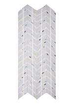 A detail shot of the PLEATS PLEASE ISSEY MIYAKE CROSSING DOTS SCARF stole.