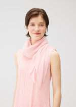 A model wears the PLEATS PLEASE ISSEY MIYAKE MONTHLY SCARF MARCH stole.