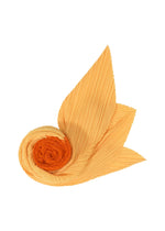 A detail shot of the PLEATS PLEASE ISSEY MIYAKE O SCARF APRIL stole.