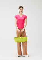 A model wears the PLEATS PLEASE ISSEY MIYAKE PLEATS BOSTON BAG pleats-boston-bag-bag-black-2.