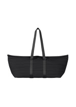 A product shot of the PLEATS PLEASE ISSEY MIYAKE PLEATS BOSTON BAG bag in black.