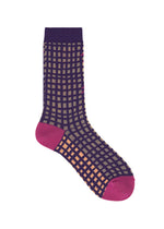 A detail shot of the PLEATS PLEASE ISSEY MIYAKE MARKET SOCKS socks.