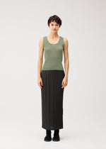 A model wears the PLEATS PLEASE ISSEY MIYAKE MIST SEPTEMBER mist-september-top-navy.