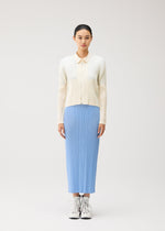 A model wears the PLEATS PLEASE ISSEY MIYAKE MONTHLY COLORS : AUGUST monthly-colors-august-jacket-off-white.