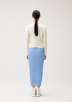A model wears the PLEATS PLEASE ISSEY MIYAKE MONTHLY COLORS : AUGUST monthly-colors-august-jacket-off-white.