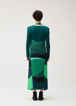 A model wears the PLEATS PLEASE ISSEY MIYAKE ORBIT orbit-vest-yellow.